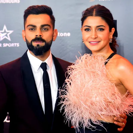 In this photograph taken on September 27, 2019, India's cricketer Virat Kohli with his wife Bollywood actress Anushka Sharma attend the second edition of ‘Indian Sports Honours’ annual ceremony in Mumbai. STR / AFP