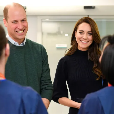 Britain's Prince William (L), Prince of Wales, and Britain's Catherine, Princess of Wales, meet with staff during a visit to the Royal Liverpool University Hospital in Liverpool on January 12, 2023. BRUCE ADAMS / POOL / AFP