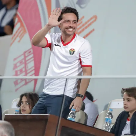 Jordan's Crown Prince Hussein greets the fans during the Group B FIFA World Cup 2022 and the 2023 AFC Asian Cup qualifying football match between Jordan and Australia in the Jordanian capital Amman on November 14, 2019. Ahmad ALAMEEN / AFP