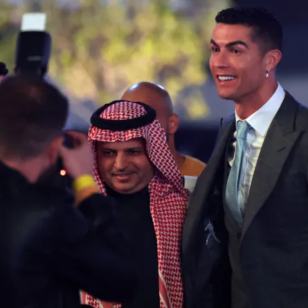 Portuguese forward Cristiano Ronaldo (R) greets President of Al-Nassr Musalli Al-Muammar upon his arrival at the Mrsool Park Stadium in the Saudi capital Riyadh on January 3, 2023, ahead of the unveiling ceremony. Fayez Nureldine / AFP