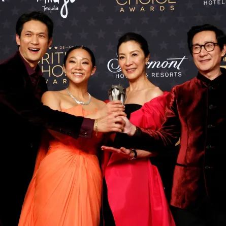 (L-R) Actors Harry Shum Jr., Stephanie Hsu, Michelle Yeoh and Ke Huy Quan pose in the press room with the award for Best Picture for "Everything Everywhere All at Once" during the 28th Annual Critics Choice Awards at the Fairmont Century Plaza Hotel in Los Angeles, California on January 15, 2023. Michael TRAN / AFP