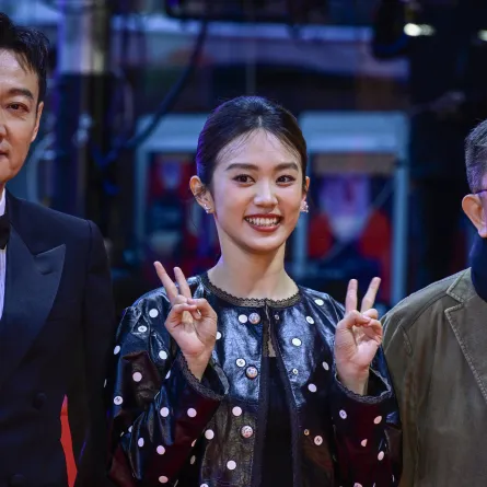 (L to R) Chinese actor Xin Baiqing, actress Huang Yao and director Zhang Lu pose on the red carpet for the film "The Shadowless Tower" in competition at the Berlinale, Europe's first major film festival of the year, on February 18, 2023 in Berlin. John MACDOUGALL / AFP