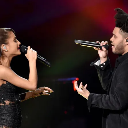 Ariana Grande and The Weeknd perform onstage at the 2014 American Music Awards at Nokia Theatre L.A. Live on November 23, 2014 in Los Angeles, California. Kevin Winter/Getty Images/AFP