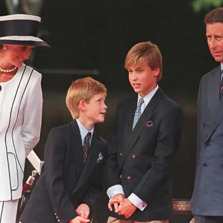 Princess Diana, her sons Harry and William, and Prince Charles as part of the commemorations of VJ Day 19 August in London.  AFP PHOTO. Johnny EGGITT / AFP