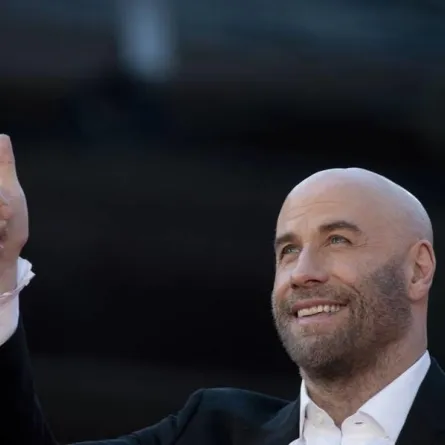 US actor John Travolta gestures as he arrives for a tribute screening on October 22, 2019 during the 14th Rome Film Festival (Festa del Cinema di Roma) at the Auditorium Parco della Musica in Rome. Tiziana FABI / AFP