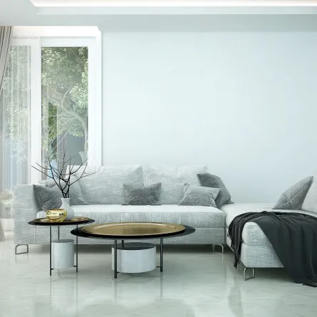 جاذبية الخامات اللماعة في غرفة الجلوس العصرية