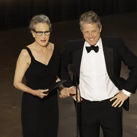 Andie MacDowell and Hugh Grant speak onstage during the 95th Annual Academy Awards at Dolby Theatre on March 12, 2023 in Hollywood, California. Kevin Winter/Getty Images/AFP