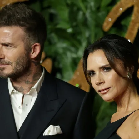 David Beckham (L) and his wife Victoria Beckham pose on the red carpet upon arrival to attend the British Fashion Awards 2018 in London on December 10, 2018Daniel LEAL / AFP