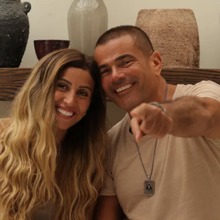 عمرو دياب ودينا الشربيني - الصورة من صفحتها الرسمية على الفيس بوك