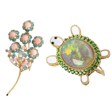 موديلات بروشات مرصعة بحجر الأوبال