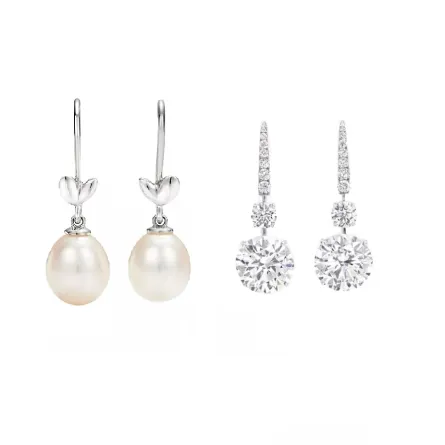 أقراط مُزينة بالكرات المتدلية لإطلالة عصرية لعروس 2023