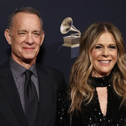 Tom Hanks (L) and his wife US singer and actress Rita Wilson arrive for the Recording Academy and Clive Davis pre-Grammy gala at the Beverly Hilton hotel in Beverly Hills, California on February 4, 2023. Michael TRAN / AFP