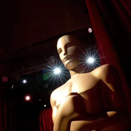 An Oscar statue stands as preparations are made along the red carpet ahead of the 95th Academy Awards, in Hollywood, California, on March 12, 2023. Stefani Reynolds / AFP