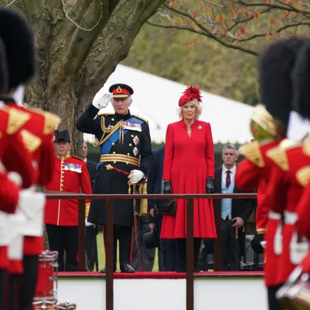 King Charles III (centre left) and Britain's Camilla, Queen Consort (centre right) attend a ceremony to present the new standards and colours to the Royal Navy, the Life Guards of the Household Cavalry Mounted Regiment, The King’s Company of the Grenadier Guards and The King’s Colour Squadron of the Royal Air Force at Buckingham Palace, in London, on April 27, 2023.  Yui Mok / POOL / AFP