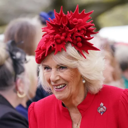 Britain's Camilla, Queen Consort, Colonel of Grenadier Guards meets guests after a ceremony to present the new standards and colours to the Royal Navy, the Life Guards of the Household Cavalry Mounted Regiment, The King’s Company of the Grenadier Guards and The King’s Colour Squadron of the Royal Air Force at Buckingham Palace, in London, on April 27, 2023. YUI MOK / POOL / AFP