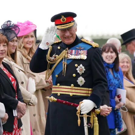  King Charles III smiles as he meets guests after a ceremony to present the new standards and colours to the Royal Navy, the Life Guards of the Household Cavalry Mounted Regiment, The King’s Company of the Grenadier Guards and The King’s Colour Squadron of the Royal Air Force at Buckingham Palace, in London, on April 27, 2023.  Yui Mok / POOL / AFP