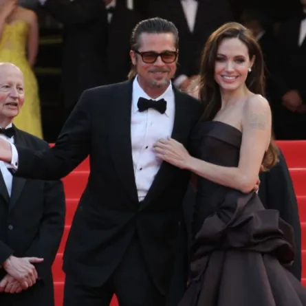 Brad Pitt and Angelina Jolie at the 64th Cannes Film Festival on May 16, 2011 in Cannes. AFP PHOTO / VALERY HACHE (Photo by VALERY HACHE / AFP)