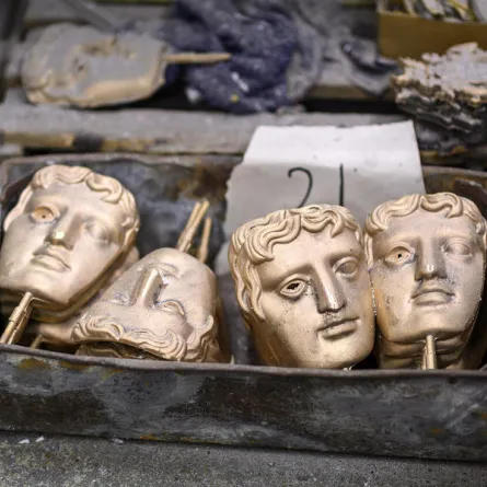 BAFTA (British Academy of Film and Television Arts) masks waiting to be fettled are pictured during a photo call at the New Pro Foundries, west of London, on January 21, 2020, ahead of the British Academy Film Awards 2020. JUSTIN TALLIS / AFP
