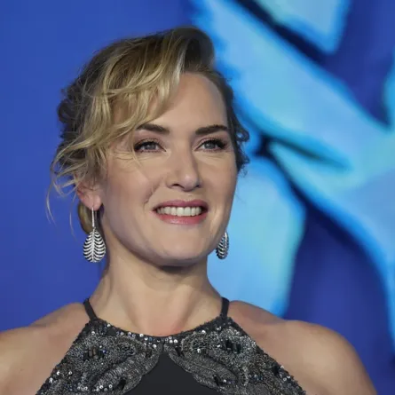 British actress Kate Winslet poses on the red carpet upon arrival for the World Premiere of the film "Avatar: The Way of Water" in London on December 6, 2022. (Photo by ISABEL INFANTES / AFP
