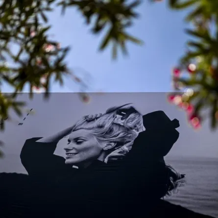 This photograph taken in Cannes, southeastern France, on May 15, 2023, shows the official poster of the 76th Cannes Film Festival. (Photo by Patricia DE MELO MOREIRA / AFP)