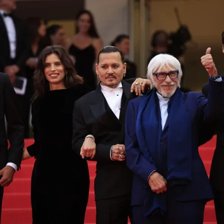 French actor Diego Le Fur, French actress and director Maiwenn, US actor Johnny Depp, French actor Pierre Richard and French actor Benjamin Lavernhe in Cannes, southern France, on May 16, 2023. (Photo by Valery HACHE / AFP)