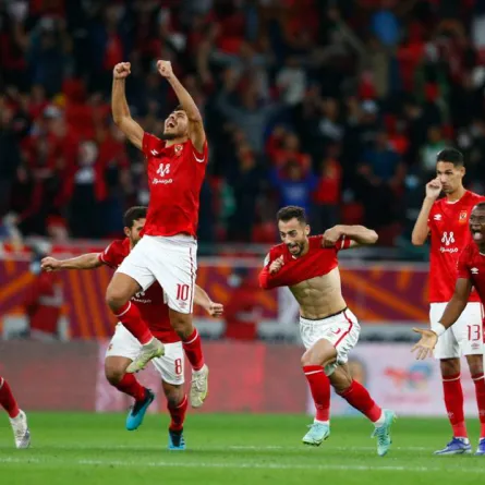 African Super Cup - Final - Al Ahly SC v Raja Casablanca - Ahmed bin Ali Stadium, Al Rayyan, Qatar - December 22, 2021 Al Ahly's Mohamed Sherif and teammates celebrate after winning the penalty shoot-out REUTERS/Amr Abdallah Dalsh