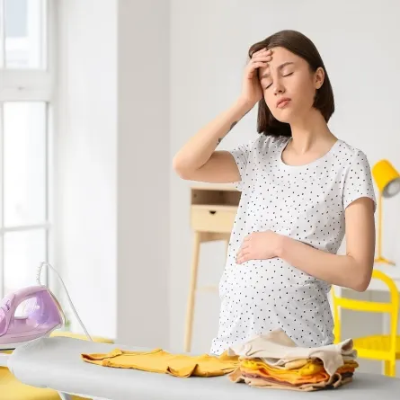 صورة لامراة حامل تشعر بالتعب