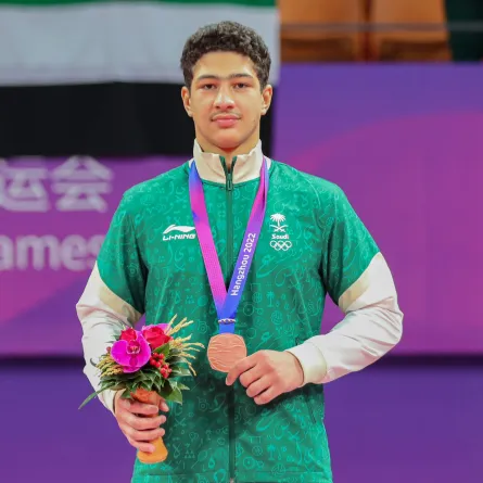 تتويج السعودي عمر ندا بالبرونزية في الجوجيتسو تحت الـ85 كجم في دورة الألعاب الآسيوية -  الصورة من حساب اللجنة الأولمبية والبارالمبية على إكس