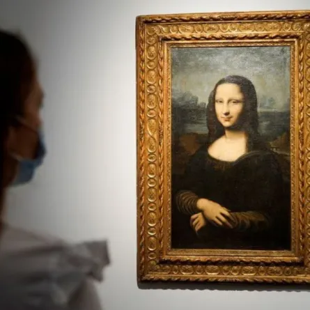 a reproduction of Leonardo Da Vinci's Mona Lisa, painted on canvas by an unknown artist from the 17th century and up for an online sale at Christie’s auction house in Paris, France, June 11, 2021. REUTERS/Lucien Libert Acquire Licensing Rights