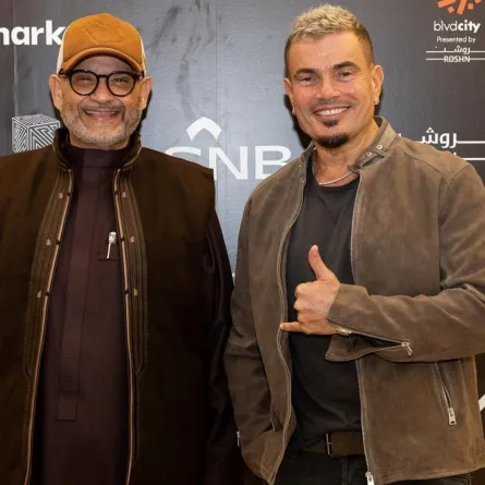 عمرو دياب وزكي حسنين رئيس مجلس ادارة مجموعة بنش مارك -الصورة من المركز الاعلامي ل بنش مارك