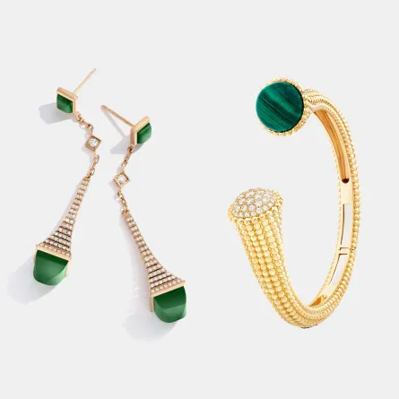 أقراط مرصوفة بالأحجار الكريمة الخضراء