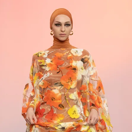 فستان بنقشة الورود من أسيام Asiyam - الصورة من Launchmetrics/Spotlight ©