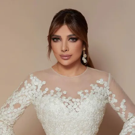 أصالة بفستان أبيض - الصورة من إنستغرام المصمم رامي العلي