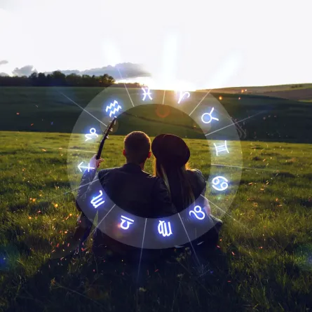 ثنائي رومانسي محاط بدائرة الأبراج