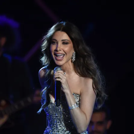  Nancy Ajram performs during the 59th edition of the Carthage International Festival at the Roman Theatre in Carthage in Tunis.  نانسي عجرم تحيي حفلًا غنائيًا خلال الدورة التاسعة والخمسين من مهرجان قرطاج الدولي على المسرح الروماني في قرطاج بتونس. مصدر الصورة: (Photo by FETHI BELAID / AFP)