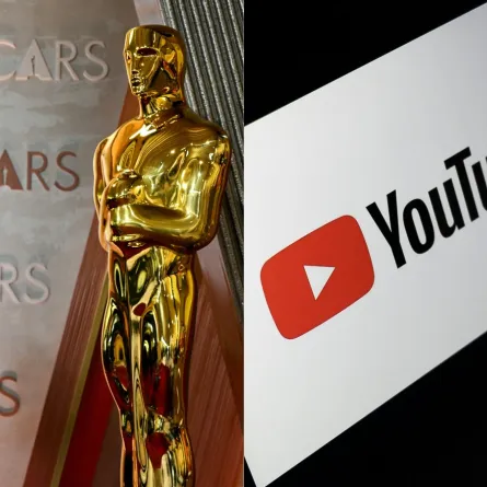 شعار يوتيوب وتمثال الأوسكار (يسارًا) في هوليوود، كاليفورنيا (  The YouTube logo and an Oscar statuette (left) in Hollywood, California ).  مصدر الصورة:ANGELA WEISS / AFP