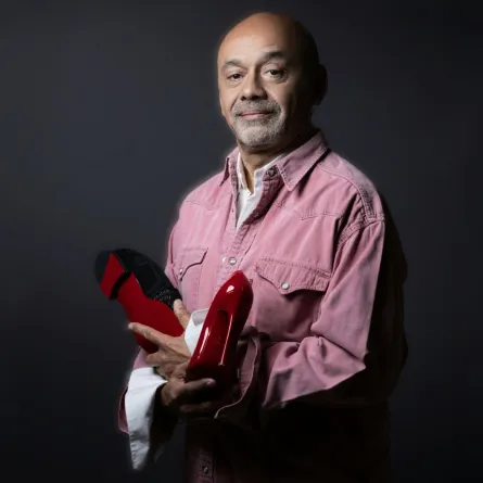 المصمم كريستيان لوبوتان Christian Louboutin- (مصدر الصورة JOEL SAGET / AFP)
