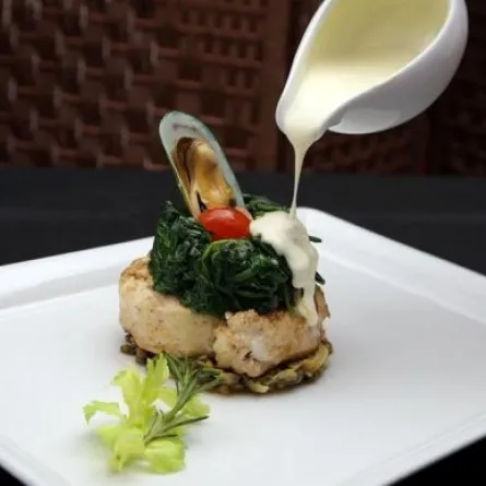 سمك الهامور مع العدس والسبانخ