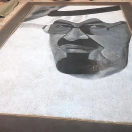 35 ألف عملة معدنية في لوحة لخادم الحرمين