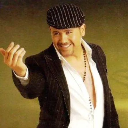 حكم بالتعويض والغرامة على هشام عباس