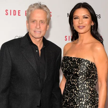 كاثرين زيتا جونز مع رجل غير زوجها في الأوسكار