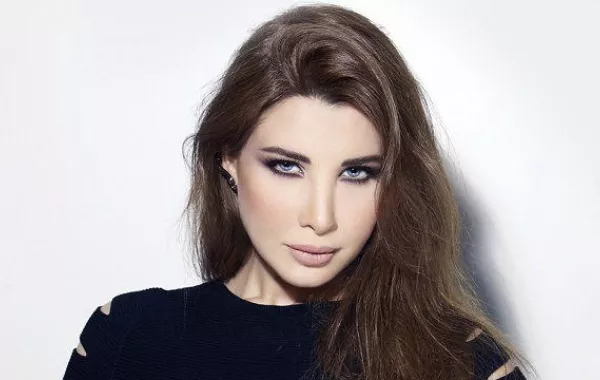 نانسي عجرم تختار ديور في سوق التنين