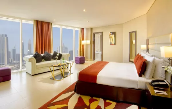 M Hotel Downtown by Millennium -Corner Suite.jpg