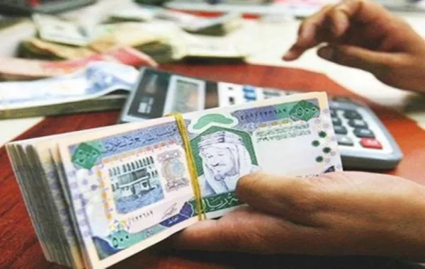 المالية السعودية: تكشف حقيقة الرسوم على التحويلات المالية للعاملين الأجانب