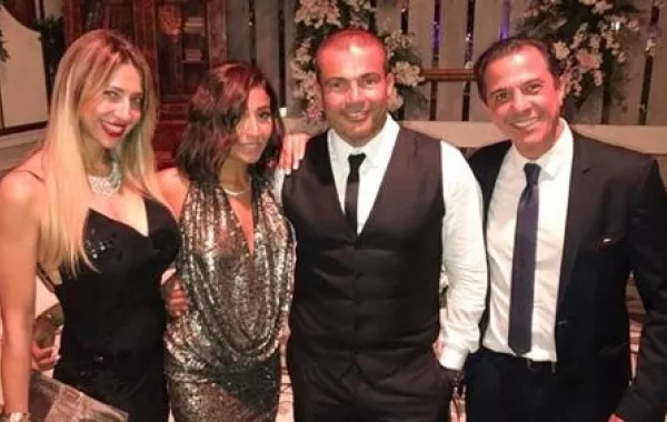 عمرو دياب يهدي أغنية "يتعلموا" لـ "دينا الشربيني"  فهل تتفوق على "برج الحوت"؟
