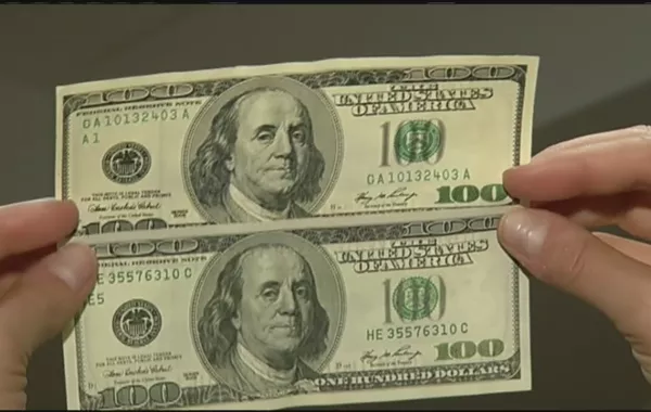 إفريقية تقود عصابة لتزوير الدولارات