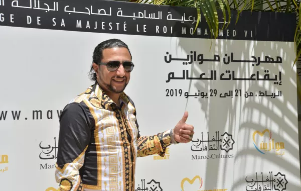 عبد الله الداودي وإكرام العبدية  تألقا  في الغناء شعبي على منصة سلا