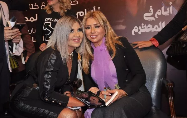 15 بوسي شلبي مع شافكي .jpg