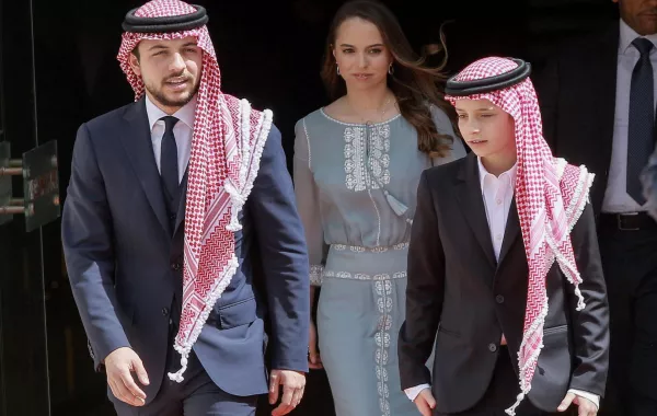 Crown Prince Hussein, his sister Princess Salma and younger brother Prince Hashem in Amman on May 25, 2019. Khalil MAZRAAWI / AFP