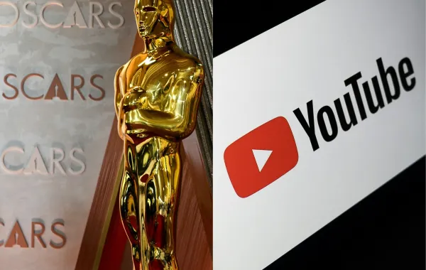 شعار يوتيوب وتمثال الأوسكار (يسارًا) في هوليوود، كاليفورنيا (  The YouTube logo and an Oscar statuette (left) in Hollywood, California ).  مصدر الصورة:ANGELA WEISS / AFP